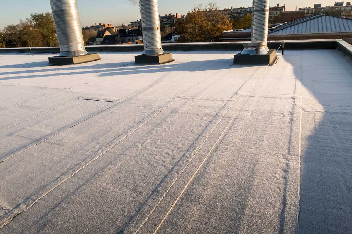 Snow covered flat roof in Minnesota