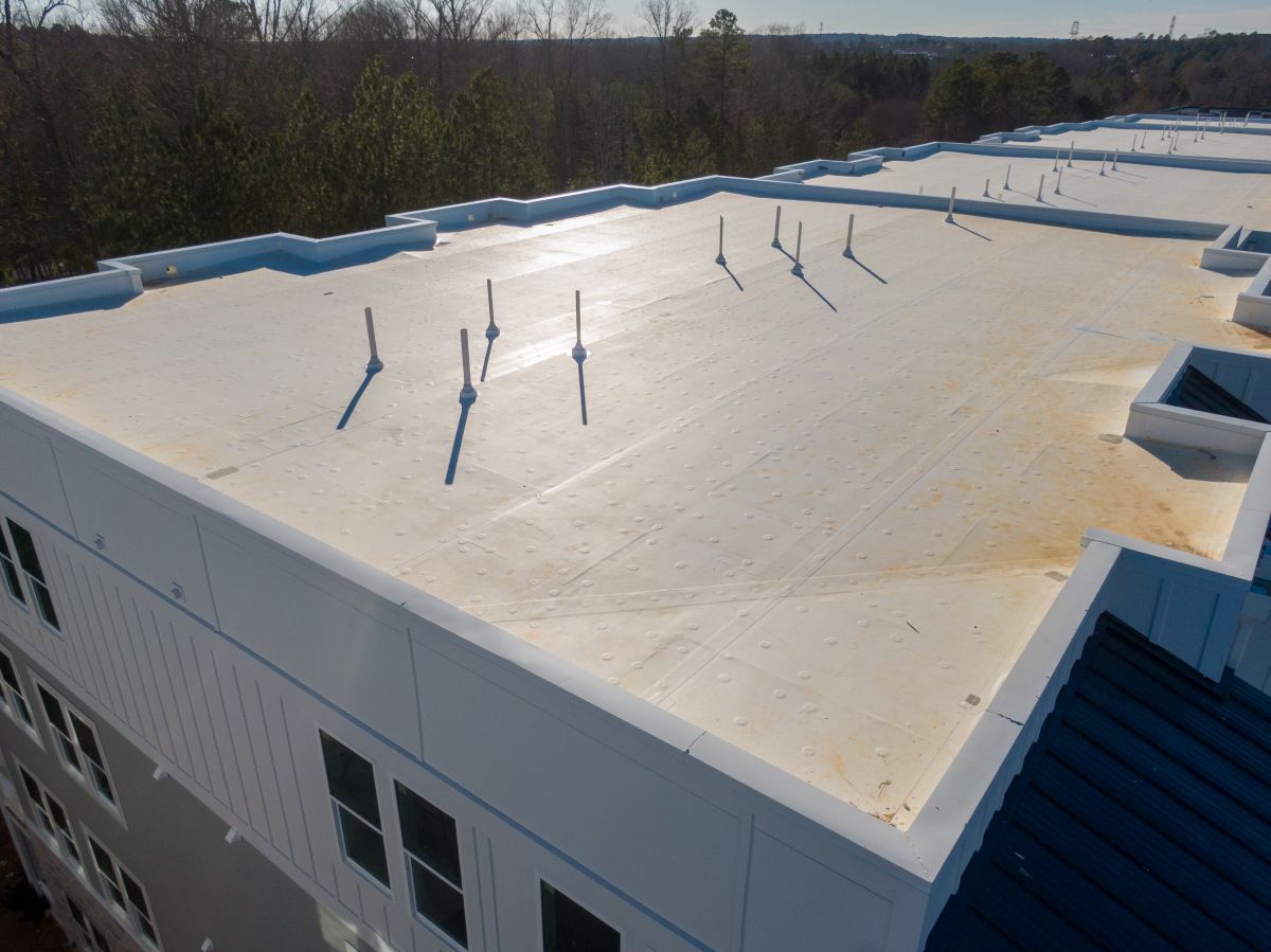 Aerial Drone Image Of A Tpo Roof On A New Residential Apartment Building