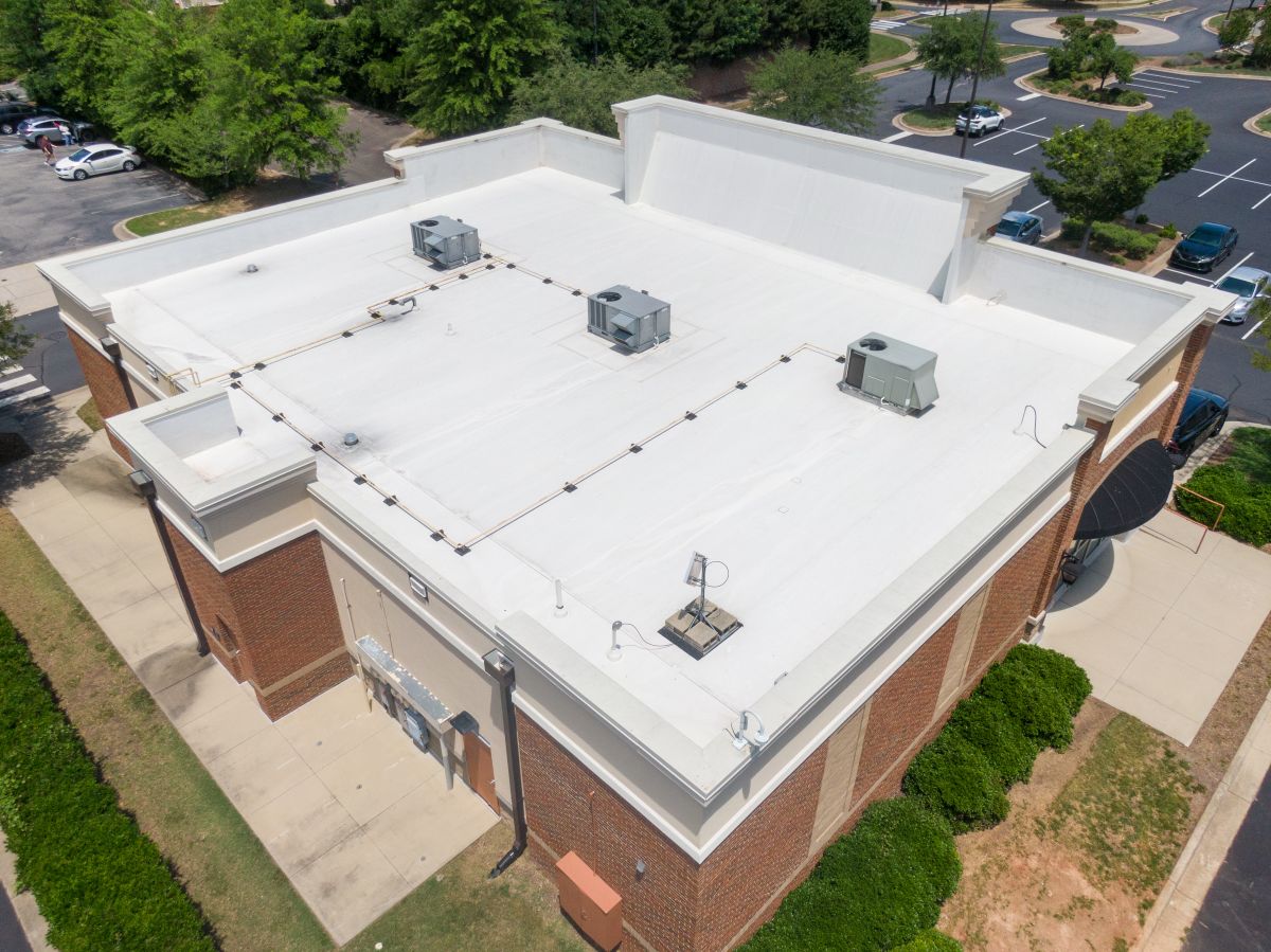 Professional Aerial Drone Image Of Commercial Roof Featuring Tpo Roof