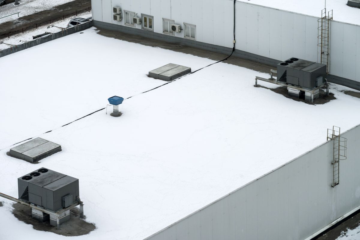 Snow Covered Commercial Roof