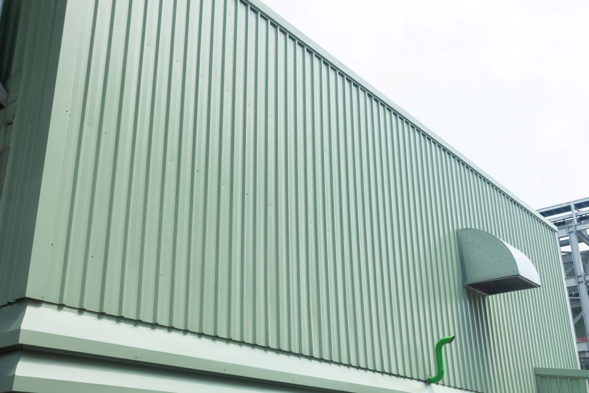 Green Metal Sheet Siding Of Building