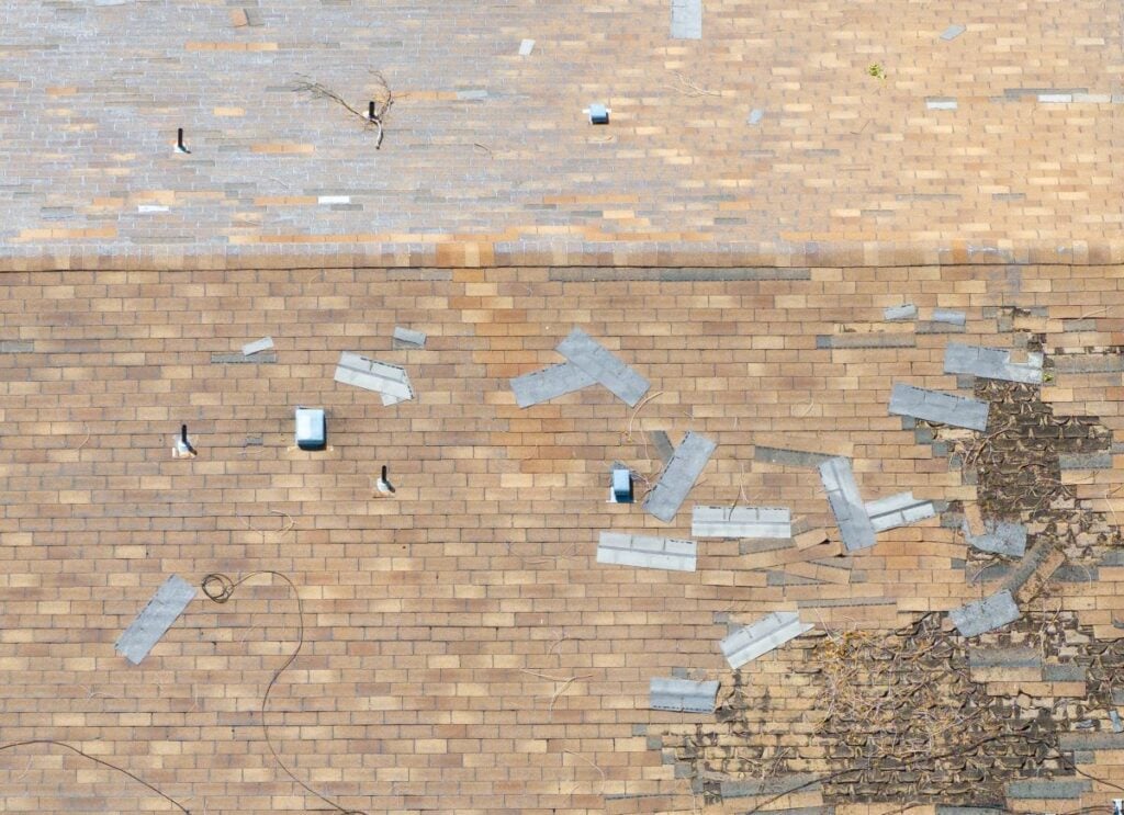 Aerial Shot Of Storm Damaged Roof