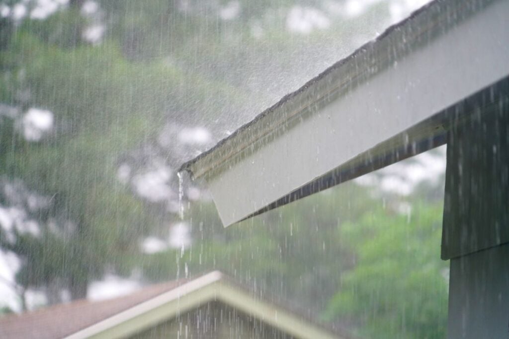 Close Up On Storm Rain On The Roof