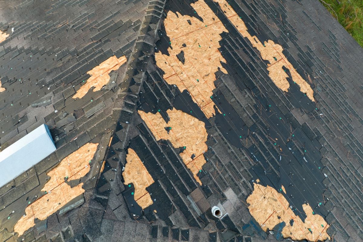 Warning Signs You Need a New Roof: Missing Shingles After Hail Damage