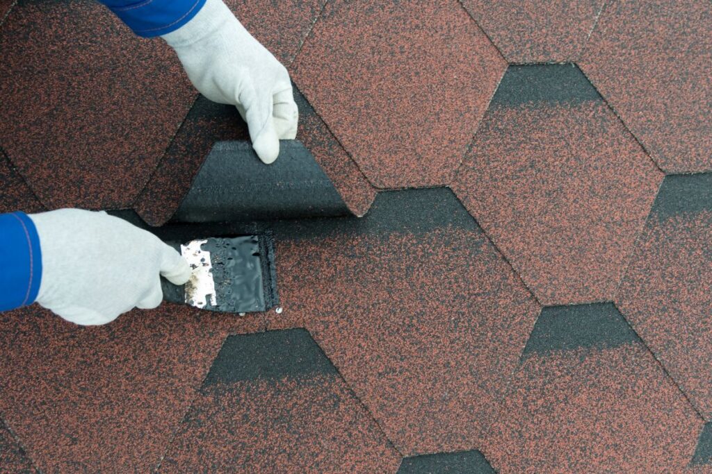How to Fix a Residential Roof Leak, Roof Repair Elimination Of Leakage Smear Seams And Cracks With A Trowel Tar