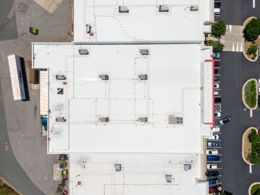 Drone Images Of Commercial Roofs Featuring Tpo And Asphalt Shingles