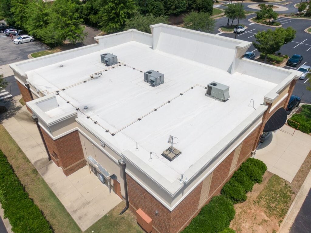 Professional Aerial Drone Image Of Commercial Roof Featuring Tpo Roof